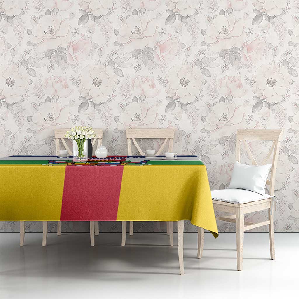 Multicolor flag-style tablecloth with yellow, red and green blocks and blue stripe