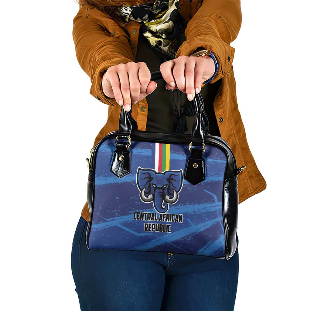 Blue football shoulder handbag with black handles and elephant logo on front