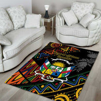Rectangular black area rug with multicolor geometric Africa crest and text