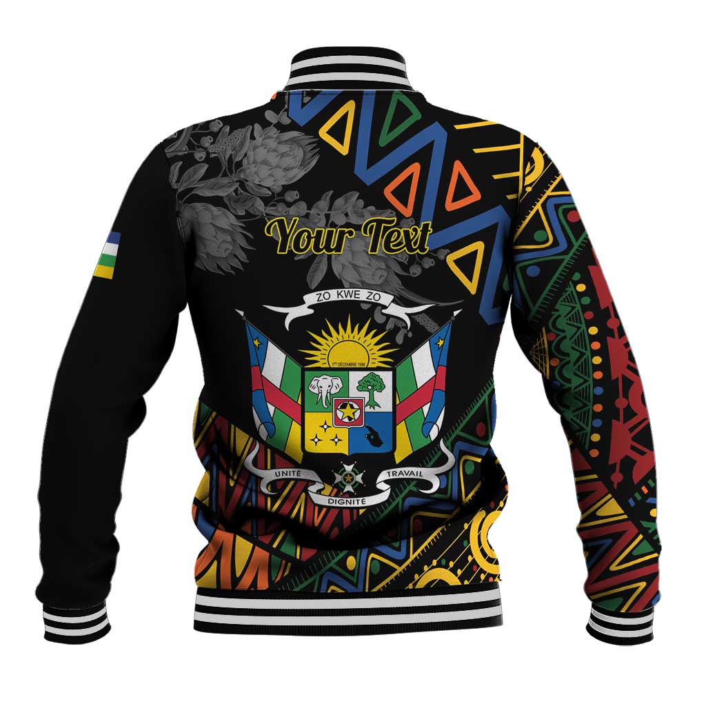 Black baseball jacket with Your Text banner, flag crest, and colorful geometric pattern