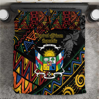 Black bedding set with colorful geometric African shield pattern and floral accents