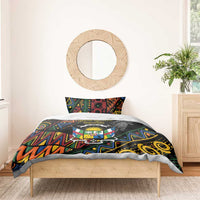 Black bedding set with colorful geometric African emblem design on duvet and pillows