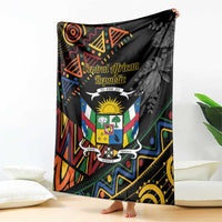 Black patterned blanket with raised corner design and Central African Republic crest