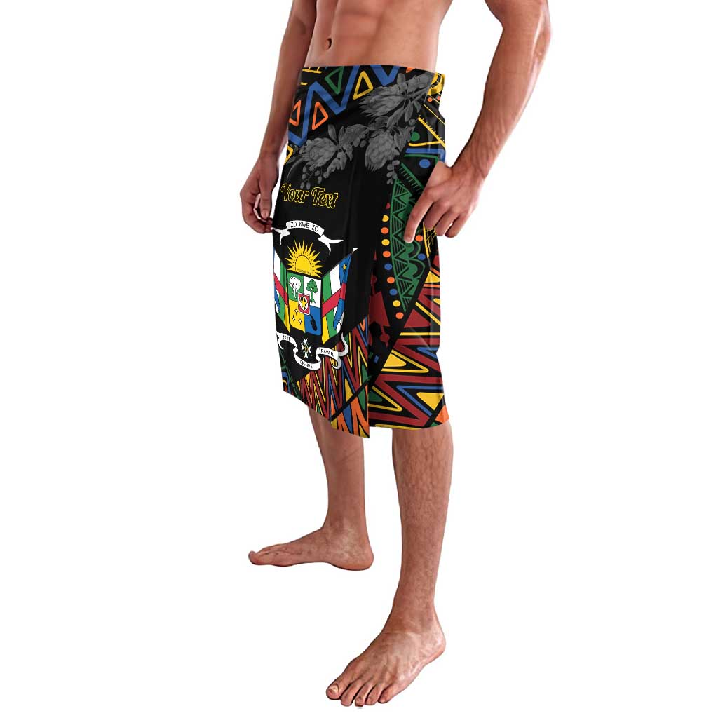 Men's African print lounge shorts with colorful shield and geometric motifs on black