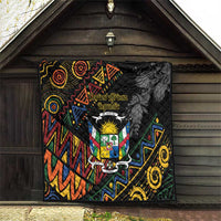 Black quilt blanket with Central African crest emblem, quilted texture, and colorful zigzag tribal patterns