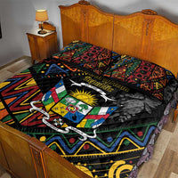 Black quilt bed set with bold crest center and two matching pillow covers