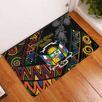 Black rubber doormat with Central African Republic crest, tribal pattern, and protea flowers