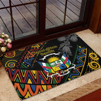 Black rectangular rubber doormat with centered Central African Republic crest, tribal border, protea