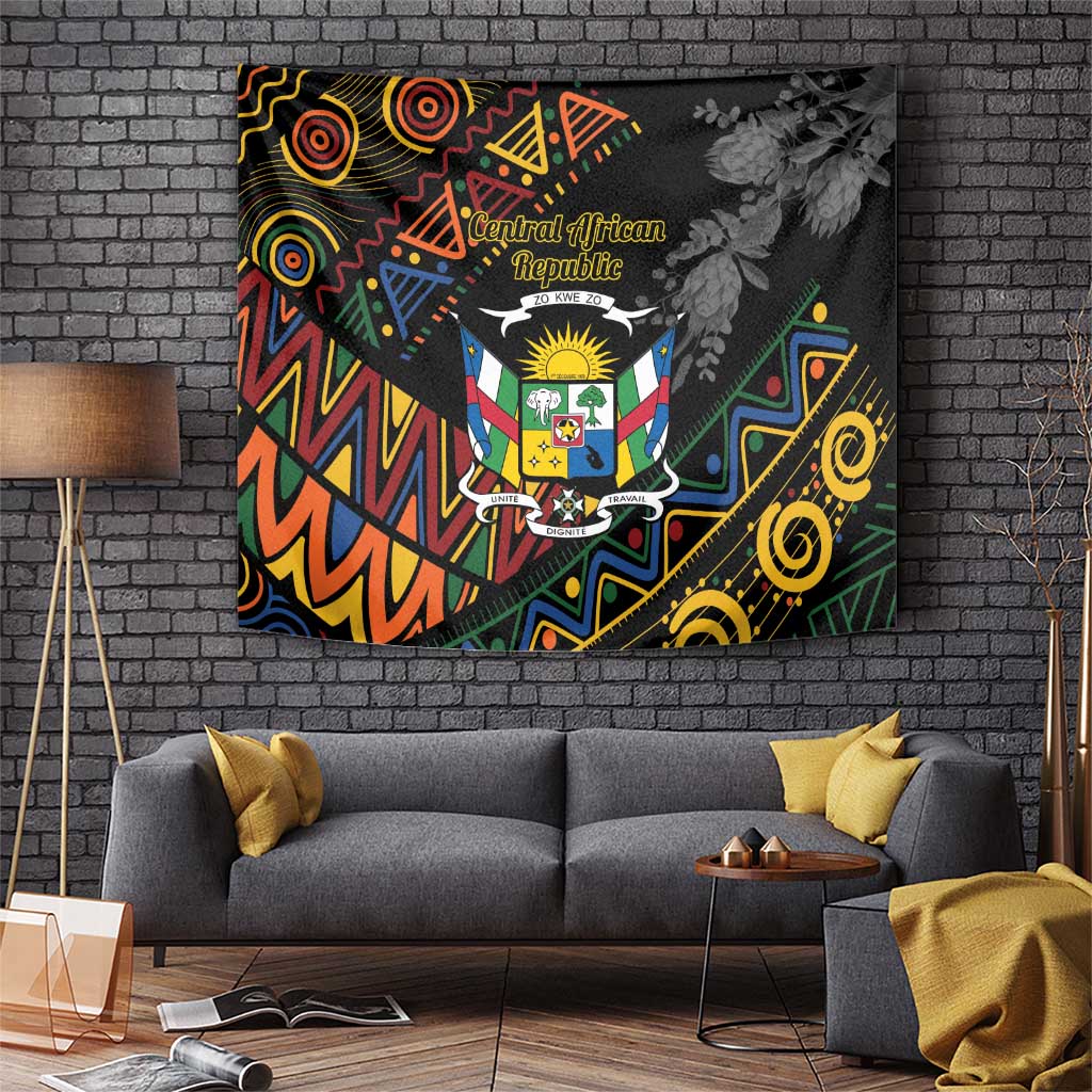 Black tapestry wall hanging with Central African crest, floral details, and bold patterns