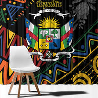 Close-up of black window curtain with Central African crest, shield and protea graphic