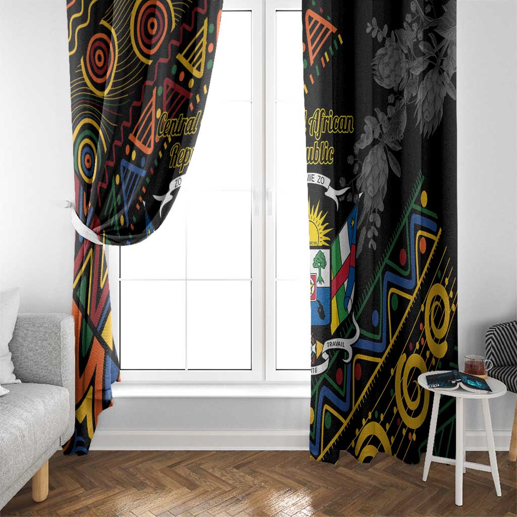 Pair of black window curtains with colorful geometric crest on left and floral on right