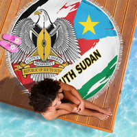 Round South Sudan flag beach blanket with fringed border, eagle emblem and green ribbon stripe