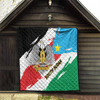 South Sudan flag quilt with quilted pattern and eagle emblem in red, blue, white, green.