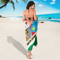 Grunge-style South Sudan flag sarong, back view with eagle emblem and star