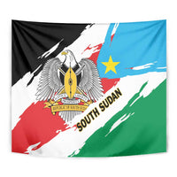 South Sudan flag tapestry close-up with eagle crest, 'SOUTH SUDAN' text, black red white blue green