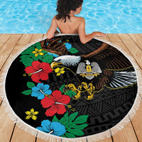 Round black beach blanket with white fringe, hibiscus flowers and centered eagle graphic