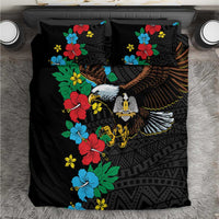 Black duvet and two pillowcases featuring hibiscus flowers and an eagle motif