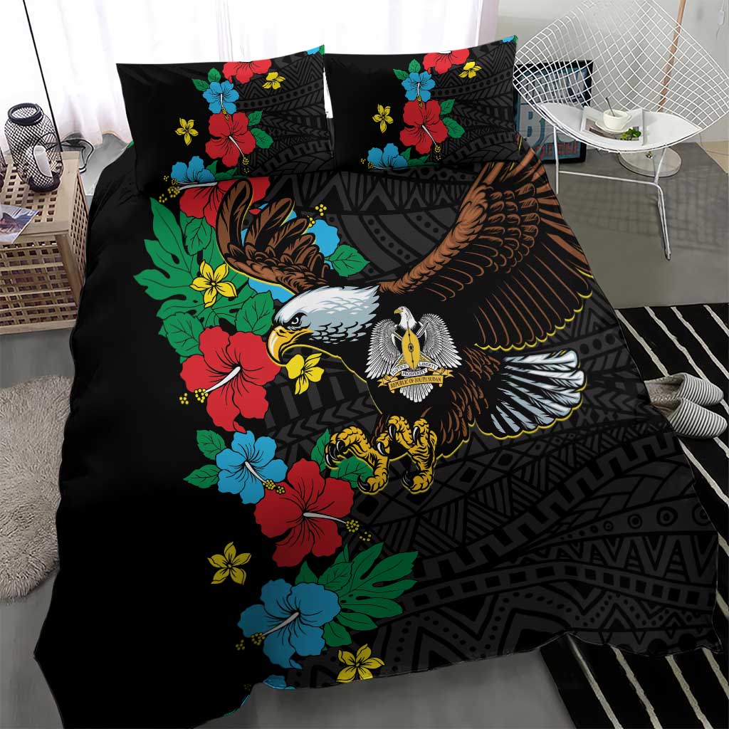 Black bedding set with hibiscus florals and detailed eagle graphic; two pillowcases