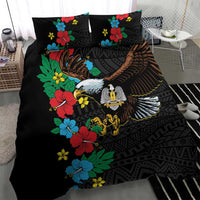 Black bedding set with hibiscus florals and detailed eagle graphic; two pillowcases
