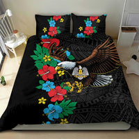 Black duvet cover with hibiscus florals and eagle graphic, shown with two pillowcases