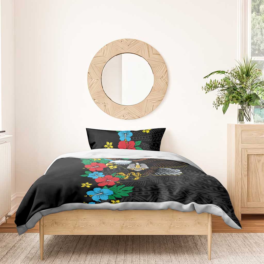 Black duvet with hibiscus floral design and eagle motif, with two matching pillowcases