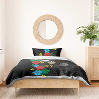 Black duvet with hibiscus floral design and eagle motif, with two matching pillowcases
