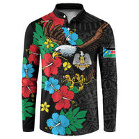 Black button polo sweatshirt with colorful hibiscus floral and eagle graphic, patterned sleeves