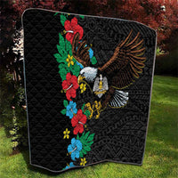 Black quilt with colorful hibiscus flowers and eagle wings central design