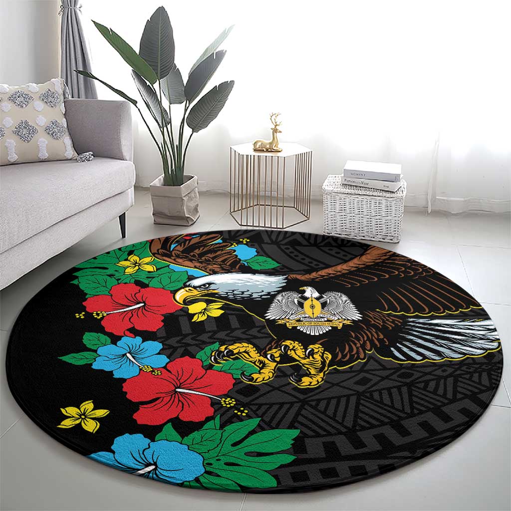 Black round carpet with hibiscus floral accents and bird-and-lion center graphic