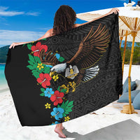 Black African sarong with hibiscus floral and eagle wing graphic, geometric pattern