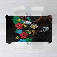 Black tablecloth with hibiscus floral print, bird motif, and dark geometric pattern