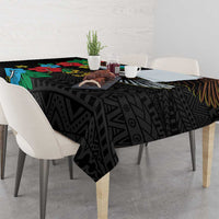 Black tablecloth with hibiscus flowers and repeating tribal-style geometric pattern
