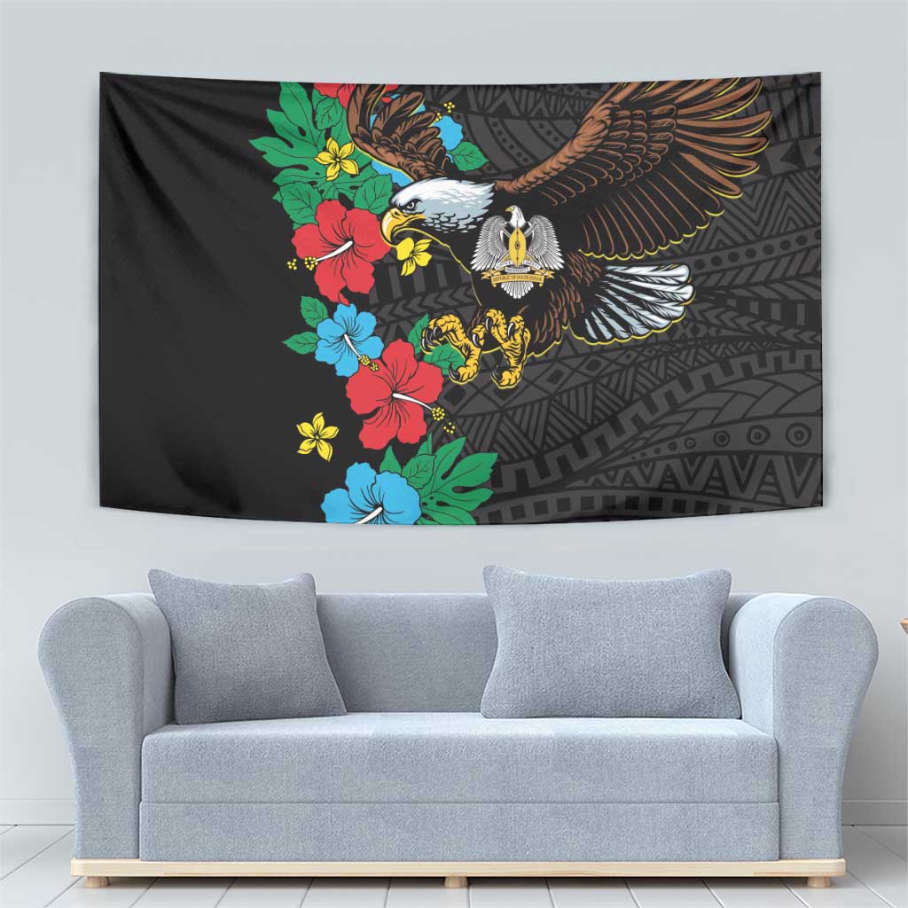 Black tapestry with raised eagle wings and vibrant hibiscus flower cluster