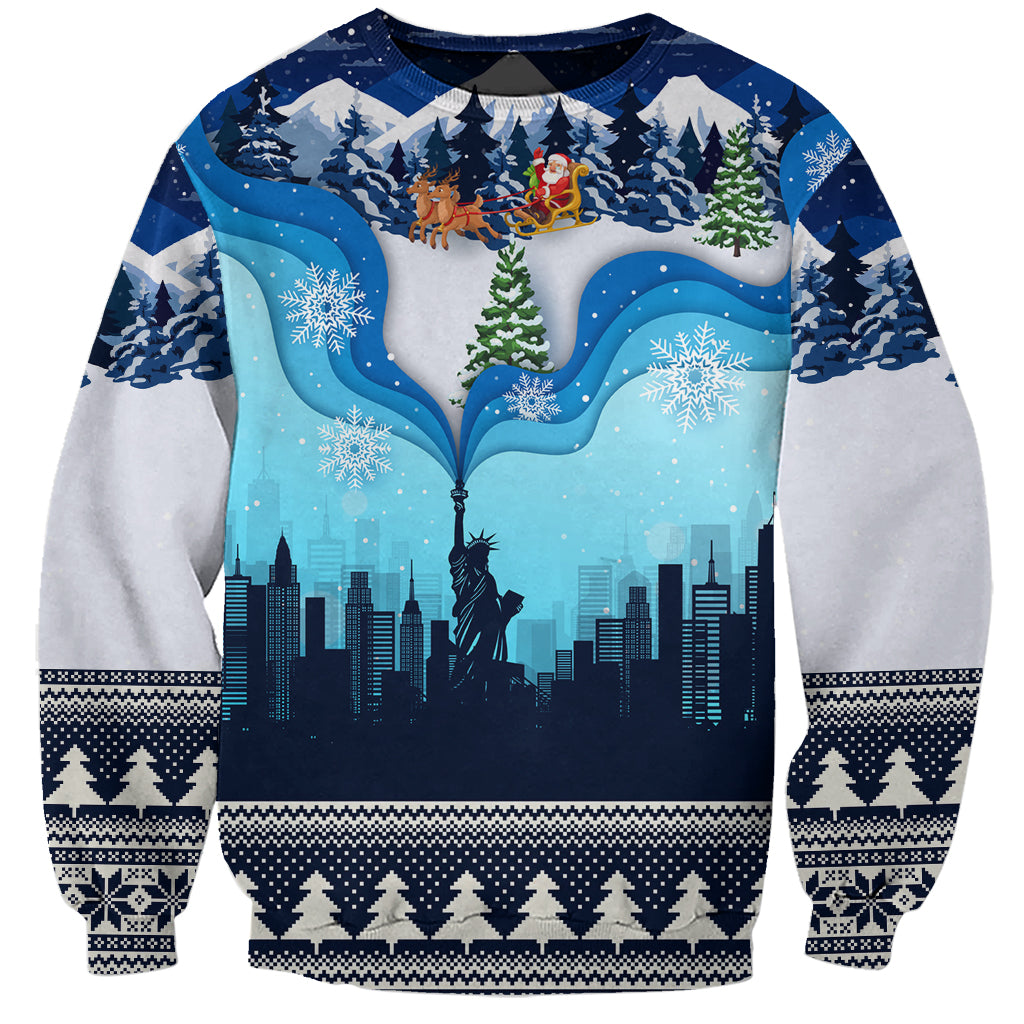 Unisex blue crewneck Christmas sweatshirt with winter city skyline and Statue of Liberty graphic