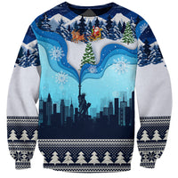 Unisex blue crewneck Christmas sweatshirt with winter city skyline and Statue of Liberty graphic