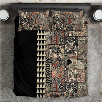 Patchwork quilt bedding set with black side panel, beige print blocks, and black-and-white zigzag strip
