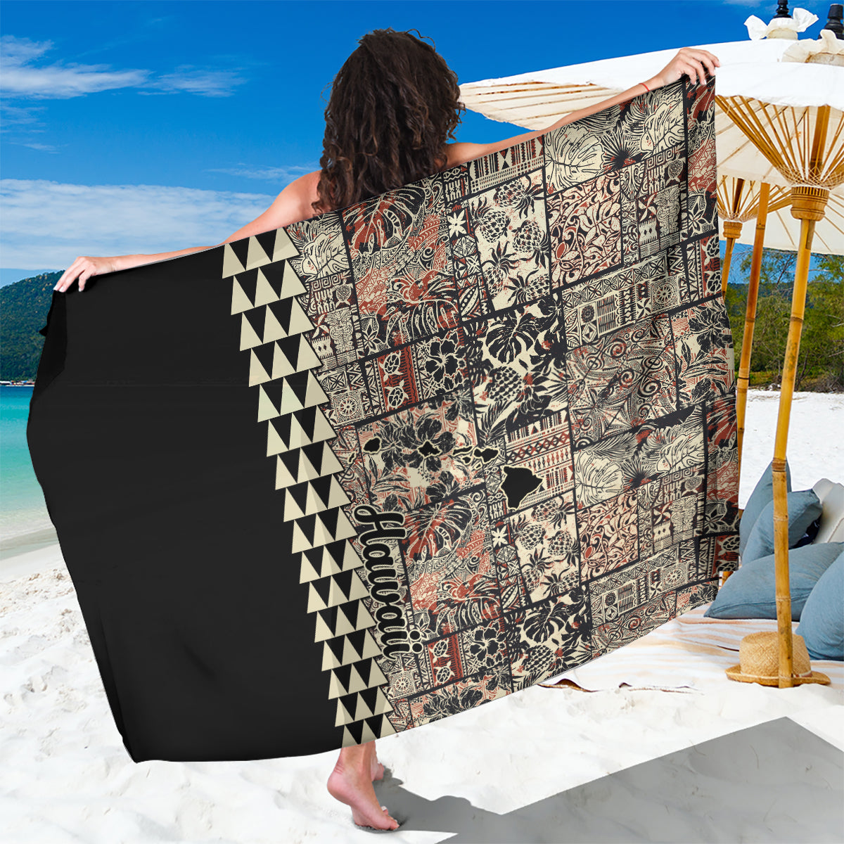 Beige quilt sarong with black geometric triangles and multicolor hibiscus floral print