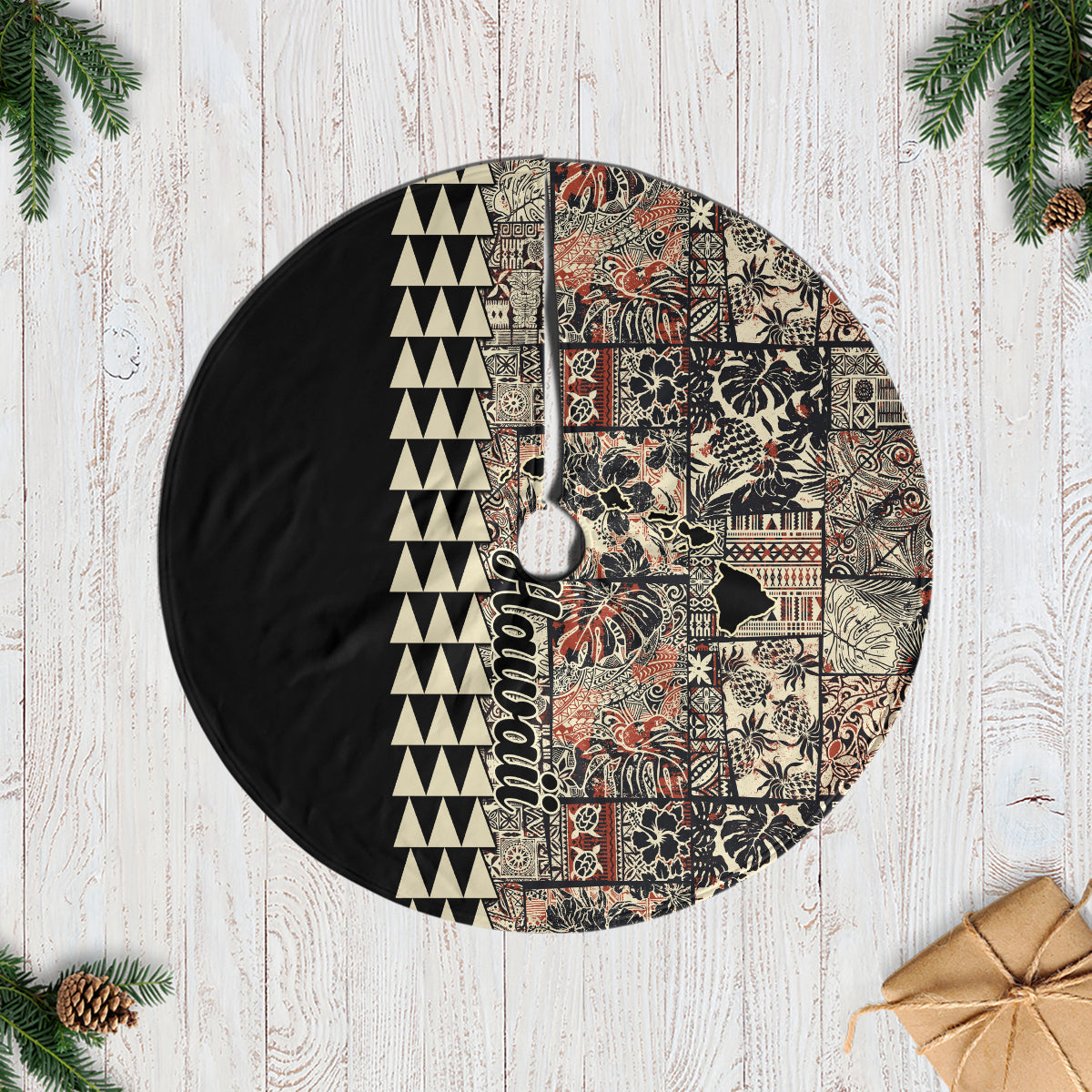 Quilted tree skirt with patchwork tropical prints, black base, center opening.