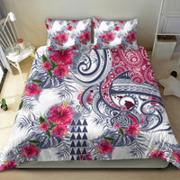 Floral tropical bedding set with 2 matching pillowcases, white with pink-red flowers and blue motifs.
