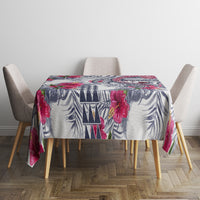 Tropical tablecloth with bold geometric and floral motifs in blue and magenta on white