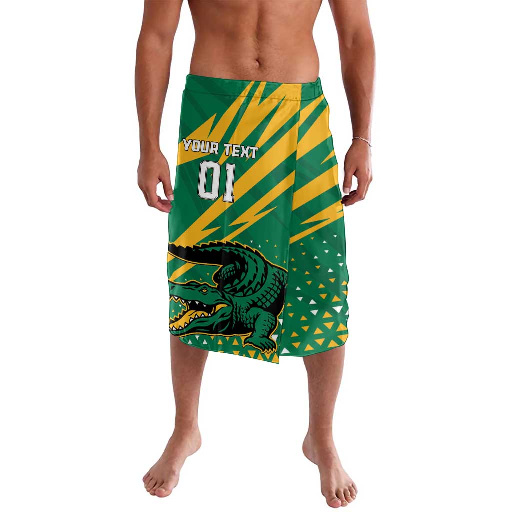 Green & yellow patterned lavalava shorts with crocodile graphic