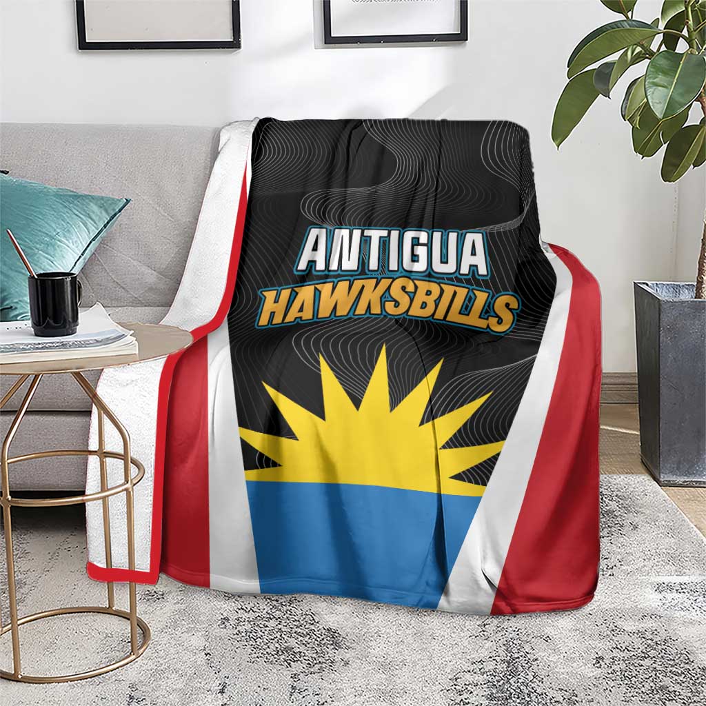 Antigua Cricket Hawksbills blanket spread on a rug, black center with blue lower panel