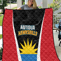 Red, black, white quilt with Antigua Hawksbills logo and sun emblem, quilted diamond texture