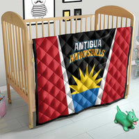 Kids quilt with red, black, blue, and white Antigua Hawksbills sun emblem