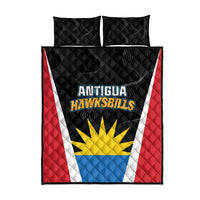 Quilt bed set featuring black quilt front with Antigua Hawksbills logo, red sides, white stripe