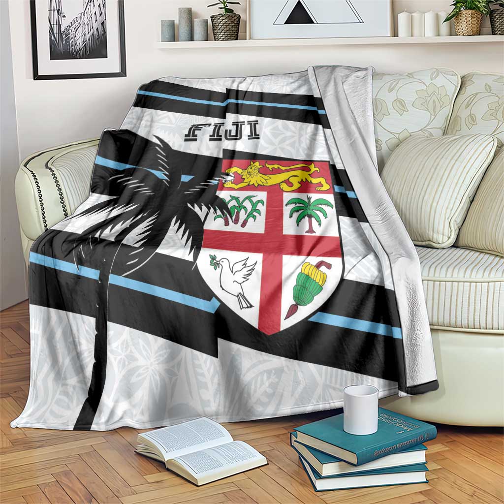 Fiji rugby blanket with white, black, and blue stripes and shield emblem with palm prints