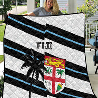 Rugby quilt with white, black and blue diagonal stripes, palm tree and Fiji crest
