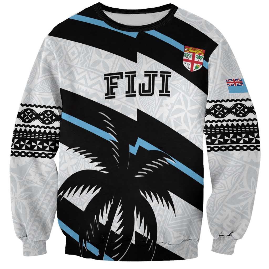 White rugby sweatshirt with black/blue diagonal stripes, tapa pattern, palm tree and crest