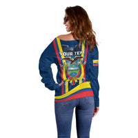 Women’s blue off-shoulder sweater back view with “YOUR TEXT” and flag panel graphic