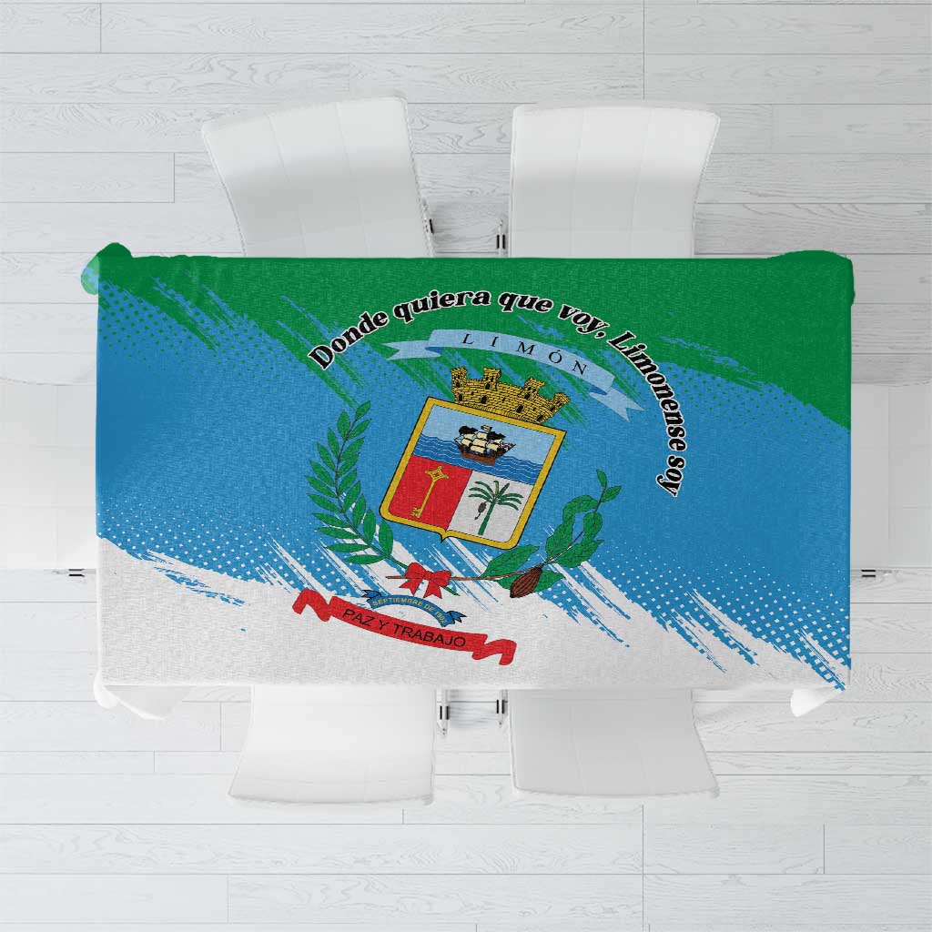 Multicolor printed tablecloth with blue-green splash design and central crest